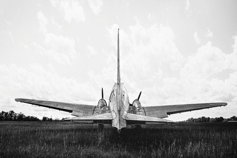 black and white aviation photo of DC-3