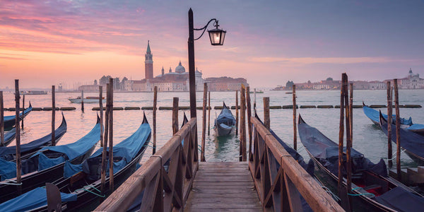 Boats in Venice at sunrise. By Lijah Hanley. 