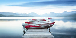 Red boats on Lake McDonald in Glacier National Park. By Lijah Hanley. 