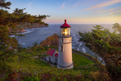 Heceta head lighthouse at sunset on the Oregon coast. By Lijah Hanley. 