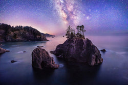 Sea cliffs and seastacks under the Milky Way on the Southern Oregon coast. By Lijah Hanley. 