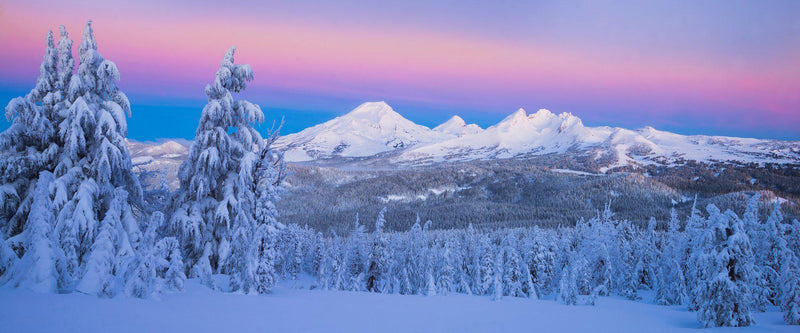 Photograph of the Three Sisters Mountains in the snow near Bend Oregon. 