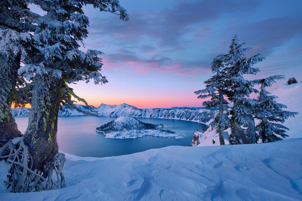 Crater Lake in the snow at sunrise
