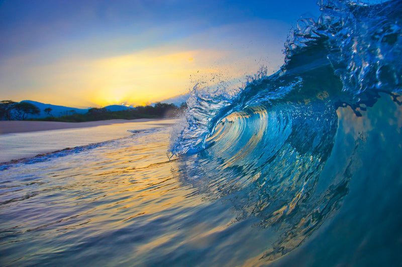 Landscape Photography of a crashing wave at sunrise on Maui Hawaii