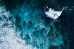 A little wave crashes through the aftermath of a massive wave 