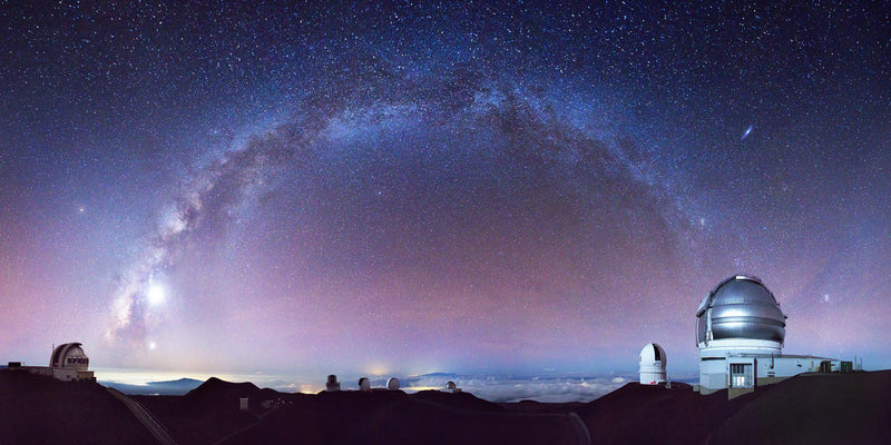 Photography of Observatories on the top of Mauna Kea under the Milky Way on the Big Island of Hawaii. 