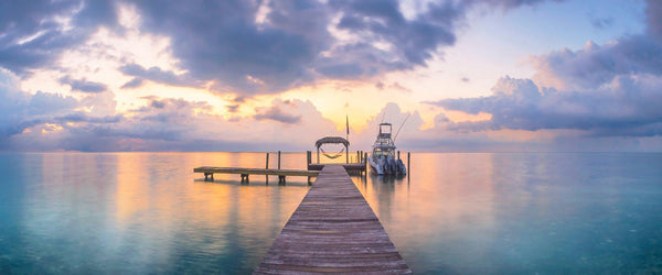 Photograph of a dock in the Florida keys at sunrise. 